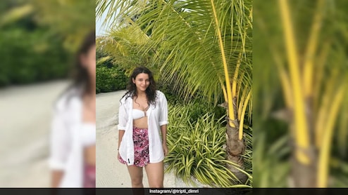 Triptii Dimri Breezes Through Her Beach Holiday In A Printed Skirt And White Shirt