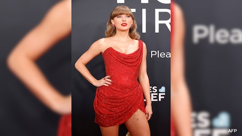 Grammys 2025: Taylor Swift's Red Vivienne Westwood Dress And 'T' Leg Chain Is A Shoutout To Travis Kelce